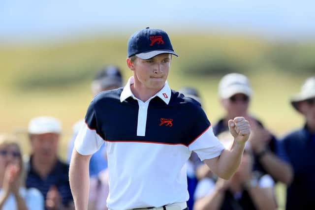 Sandy Scott of the Great Britain and Ireland team celebrates a birdie to win the first hole in his match against Brandon Wu of the US during the singles matches on the final day of the 2019 Walker Cup Match at Royal Liverpool. Picture: David Cannon/Getty Images