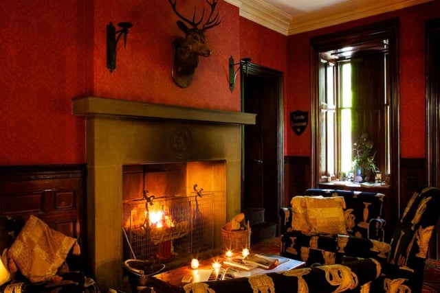 The Tulloch Castle Hotel offers guests a regal stay in a 12th-century-castle set in the beautiful Highlands of Scotland, five minutes from Dingwall. There are a number of spectres said to haunt its atmospheric corridor but the most famous is the Green Lady, after whom the hotel bar is named. She is seen in a long silk dress, and is said to fill those who spot her with great sorrow as they hear her whisper "why?". Investigators have seen unexplained balls of light and orbs, felt icy cold patches of air, and heard clicks, bangs and thuds.