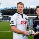 Grant Sheills of Southern Knights and Jordan Lenac of Ayrshire Bulls with the Super6 trophy. (Photo by Ross Parker / SNS Group)