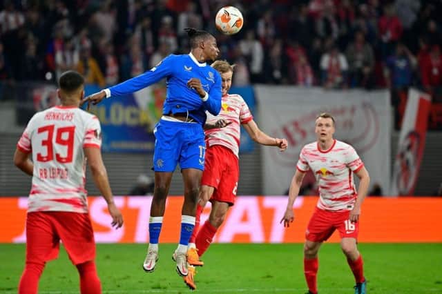 Rangers' Nigerian midfielder Joe Aribo and Leipzig's Austrian midfielder Konrad Laimer. (Photo by JOHN MACDOUGALL/AFP via Getty Images)