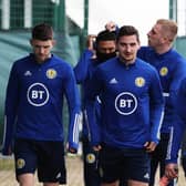 Relax, we'll do it: Ryan Christie, Kenny McLean and John McGinn have been told to focus on themselves rather than Euro 2020 and what tonight's match with Serbia means to the nation