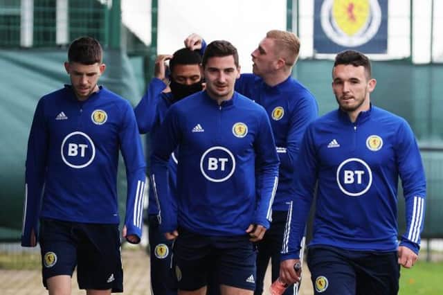 Relax, we'll do it: Ryan Christie, Kenny McLean and John McGinn have been told to focus on themselves rather than Euro 2020 and what tonight's match with Serbia means to the nation