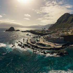 The stunning Porto Moniz tidal swimming pool in the foreground, which has been voted one of the best of its kind in the world. Picture: DigitalTravelCouple.