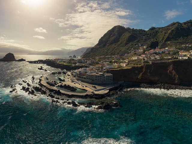 The stunning Porto Moniz tidal swimming pool in the foreground, which has been voted one of the best of its kind in the world. Picture: DigitalTravelCouple.