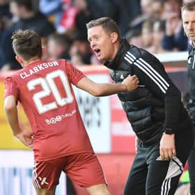 Aberdeen's opening goalscorer Leighton Clarkson celebrates with manager Barry Robson. (Photo by Craig Foy / SNS Group)