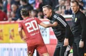Aberdeen's opening goalscorer Leighton Clarkson celebrates with manager Barry Robson. (Photo by Craig Foy / SNS Group)