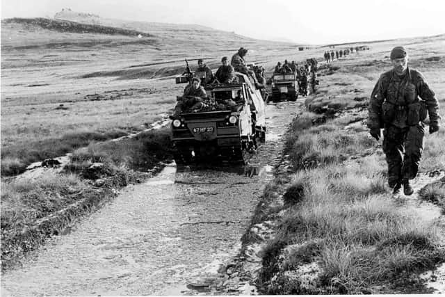 Marines from 45 Commando advance through minefields en route to Port Stanley on 14 June 1982.