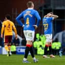 Rangers midfielder Scott Arfield holds his head in despair at full-time after the Scottish champions dropped two points in a 2-2 draw against Motherwell at Ibrox. (Photo by Craig Williamson / SNS Group)