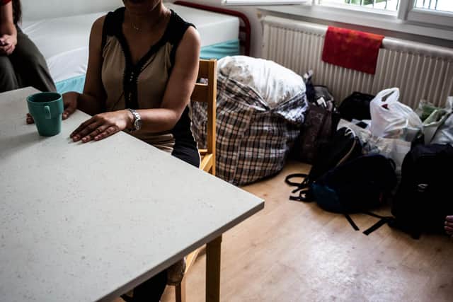 A woman is pictured in the centre d'hebergement et de reinsertion sociale (CHRS), a shelter dedicated to women, victims of domestic violence, run by SOS Femmes alternative NGO, in Chatillon, south of Paris, on August 7, 2019. - For 33 years the shelter hosts women in emergency situation and because of a lack of room, had to refuse 329 requests in 2018. (Photo by Martin BUREAU / AFP)        (Photo credit should read MARTIN BUREAU/AFP via Getty Images)