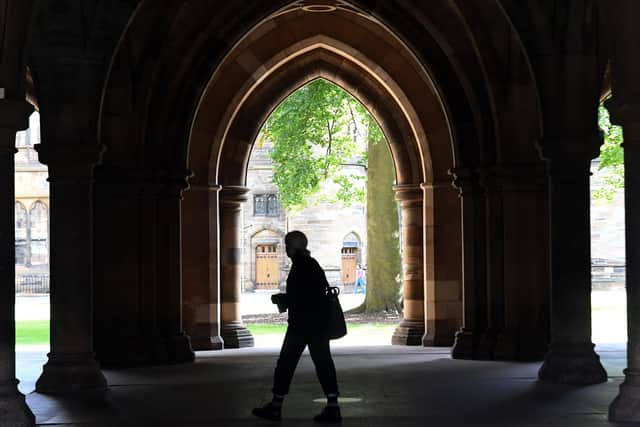 A student walks on campus at Glasgow University. Picture: Andy Buchanan/AFP via Getty Images