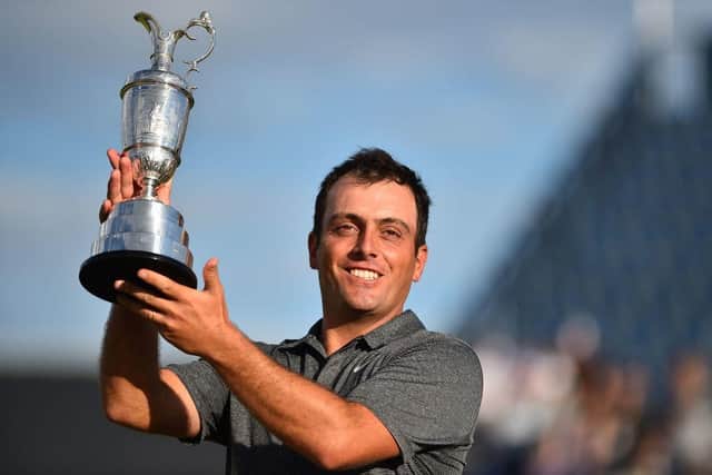 Francesco Molinari poses with the Claret Jug after winnng the 147th Open at Carnoustie in 2018. Picture: Glyn KIRK/AFP via Getty Images.