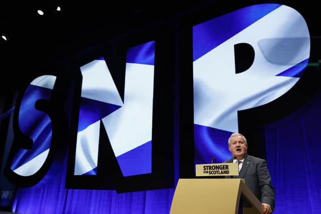 Ian Blackford, seen addressing the SNP conference in October, has been forced out as the party's Westminster leader (Picture: Jeff J Mitchell/Getty Images)