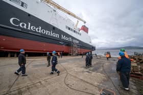 Shipbuilders carry out last minute works and preparations before the MV Glen Rosa is launched at Ferguson Marine Port Glasgow shipyard, marking the first time the vessel will enter the water. Picture: Jane Barlow/PA Wire