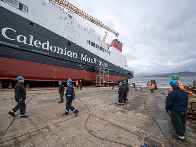 Shipbuilders carry out last minute works and preparations before the MV Glen Rosa is launched at Ferguson Marine Port Glasgow shipyard, marking the first time the vessel will enter the water. Picture: Jane Barlow/PA Wire