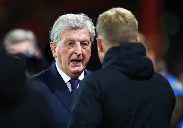 Roy Hodgson, manager of Crystal Palace shakes hands with then-Bournemouth boss Eddie Howe in 2018