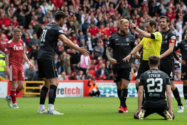 St Mirren defender Declan Gallagher was sent off on his return to Pittodrie.