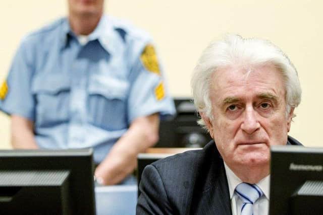 Bosnian Serb wartime leader Radovan Karadzic sits in the courtroom for the reading of his verdict in The Hague in 2016 picture: AFP/Getty Images