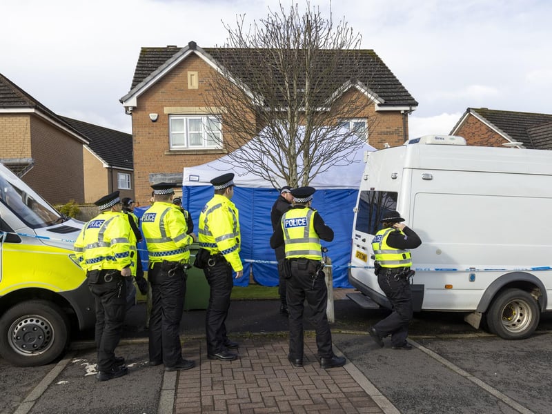 Officers from Police Scotland outside the home of former chief executive of the Scottish National Party (SNP) Peter Murrell, in Uddingston, Glasgow, after he was "released without charge pending further investigation", after he was arrested on Wednesday as part of a probe into the party's finances.