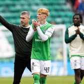 Hibs manager Nick Montgomery and Rory Whittaker applaud fans at full time after the 2-0 win over St Johnstone. (Photo by Ross Parker / SNS Group)