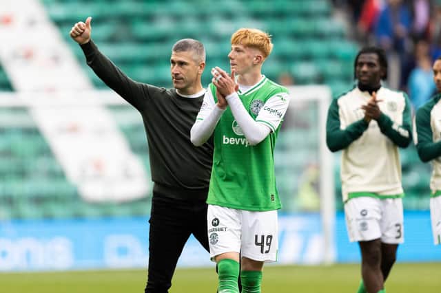 Hibs manager Nick Montgomery and Rory Whittaker applaud fans at full time after the 2-0 win over St Johnstone. (Photo by Ross Parker / SNS Group)