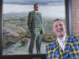 Doddie Weir with his painting in the Scottish National Portrait Gallery (SNPG)