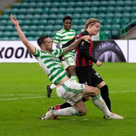Jens Petter Hauge makes it 3-1 to AC Milan at Celtic Park. Picture: SNS