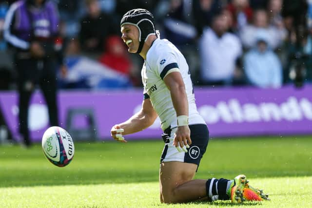 Darcy Graham is all smiles after scoring his and Scotland's second try in the win over Italy in the Summer Nations Series at Scottish Gas Murrayfield.  (Photo by Ross MacDonald / SNS Group)