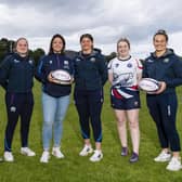 Referee Hollie Davidson, Scotland player Evie Gallagher, Head of Women and Girl’s Strategy Gemma Fay, Scotland player Lisa Thomson and Scotland captain Rachel Malcolm are pictured with players from Lismore during the launch of the Women and Girls Strategy 2022-2026.  (Photo by Mark Scates / SNS Group)