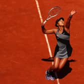 Naomi Osaka serves to Patricia Maria Tig of Romania during her first-round victory at the French Open at Roland Garros. Picture: Julian Finney/Getty Images