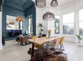 Vintage colours and bold paint designs open up the room