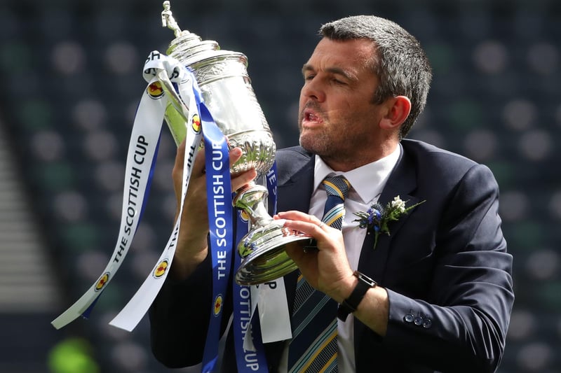 St Johnstone manager Callum Davidson celebrates with the Scottish Cup trophy after the final whistle during the Scottish Cup final match at Hampden Park, Glasgow.