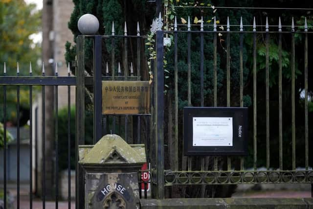 Protesters were dragged into consulate grounds and beaten during a gathering in front of China's Consulate in Manchester.