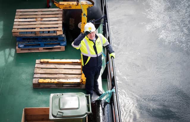 Britain's Prime Minister Boris Johnson gestures onboard the Esvagt Alba during a visit to the Moray Offshore Windfarm East, off the Aberdeenshire coast, on Thursday. There was plenty he could have said about the future of energy production in Scotland, but the Prime Minister opted to say something daft - and inaccurate - instead, writes Brian Wilson. Photo by JANE BARLOW/POOL/AFP via Getty Images.