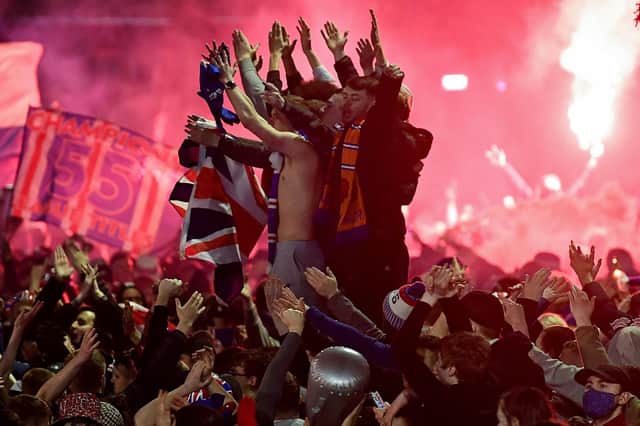 Rangers fans gather in Glasgow's George Square to celebrate the club winning the Scottish Premiership for the first time in ten years on March 7. Picture: Jeff J Mitchell/Getty Images