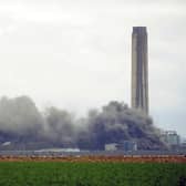 The demolition of Longannet Power Station in Kincardine continued this morning with the last remaining main structure taken down. Picture: Michael Gillen.