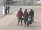 This video grab taken from a footage shown by Russian state media shows US basketball star Brittney Griner (L) during a swap of prisoners with Viktor Bout (2ndR), a Russian notorious arms dealer(Photo by -/Russian State Media/AFP via Getty Images)