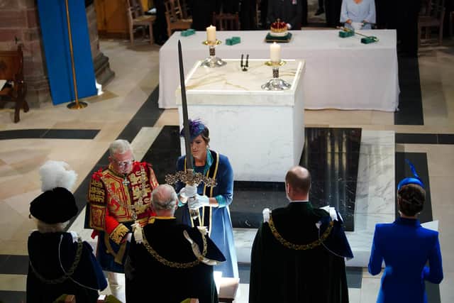 The Elizabeth Sword, part of the Honours of Scotland and carried by Dame Katherine Grainger, is presented to King Charles III at St Giles' Cathedral: Peter Byrne/PA Wire