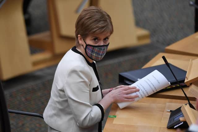 Nicola Sturgeon wears a face mask in the Scottish Parliament (Picture: Andy Buchanan/PA)
