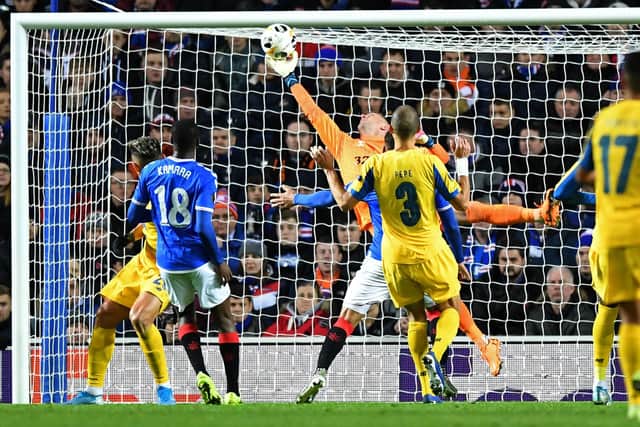 Allan McGregor makes a trademark reaction save during a Europa League match between Rangers and Porto at Ibrox. (Photo by ANDY BUCHANAN/AFP via Getty Images)