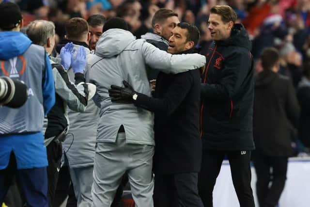 Rangers manager Giovanni van Bronckhorst celebrates at full-time after his team's Europa League knockout round play-off tie triumph over Borussia Dortmund. (Photo by Alan Harvey / SNS Group)