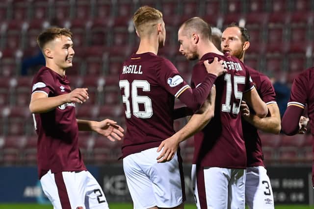 Craig Wighton broke his scoring duck for Hearts.