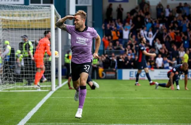 Scott Arfield celebrates making sure of all three points for Rangers after completing the scoring in their 4-2 win over Ross County in Dingwall. (Photo by Alan Harvey / SNS Group)