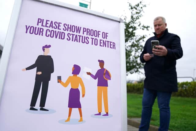 Signage informing spectators they need to show their vaccine passports to enter the ground before the UEFA Europa League Group G match at Celtic Park. Picture: PA