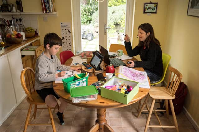 The Covid pandemic saw many people start working from home and there's no great rush to return to the office (Picture: Oli Scarff/AFP via Getty Images)