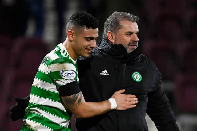 Celtic's Giorgos Giakoumakis (left) with manager Ange Postecoglou at full time after the 2-1 win over Hearts at Tynecastle. (Photo by Rob Casey / SNS Group)