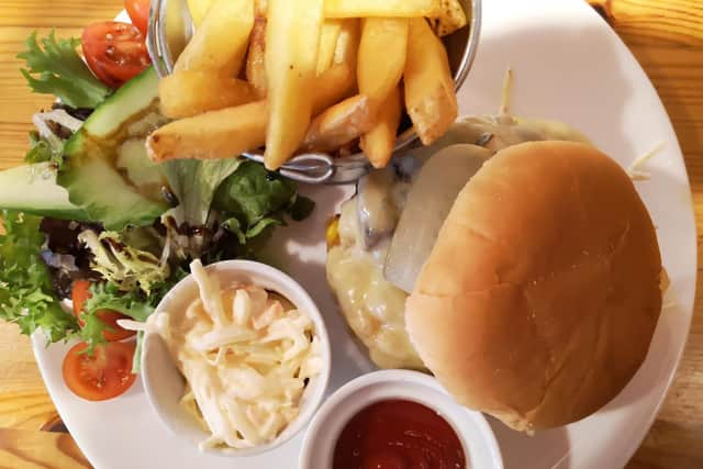 Spicy bean burger and side order of chips.