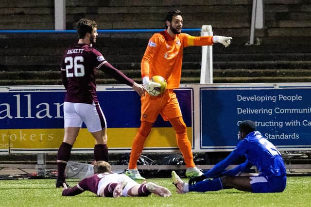 Craig Gordon will return in goal for Hearts against Dunfermline.