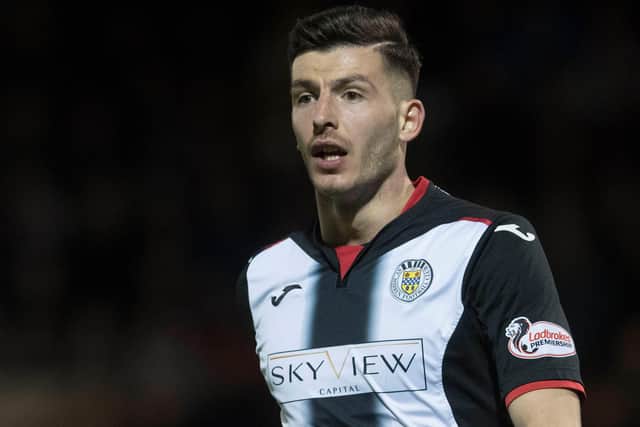 Mihai Popescu is waiting to fly to Edinburgh to join Hearts.