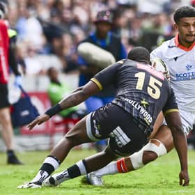 Edinburgh's Jake Henry on the attack against Sharks full-back Aphelele Fassi during the EPCR Challenge Cup quarter-final at Kings Park, Durban. (Photo: Steve Haag Sports/INPHO/Shutterstock)