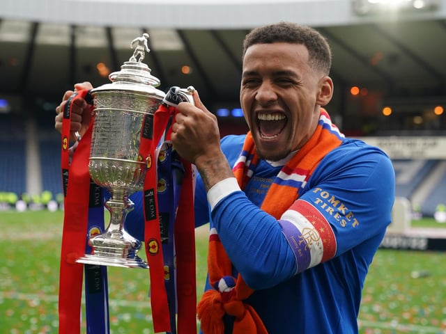 Rangers’ James Tavernier celebrates with the Scottish Cup at full time